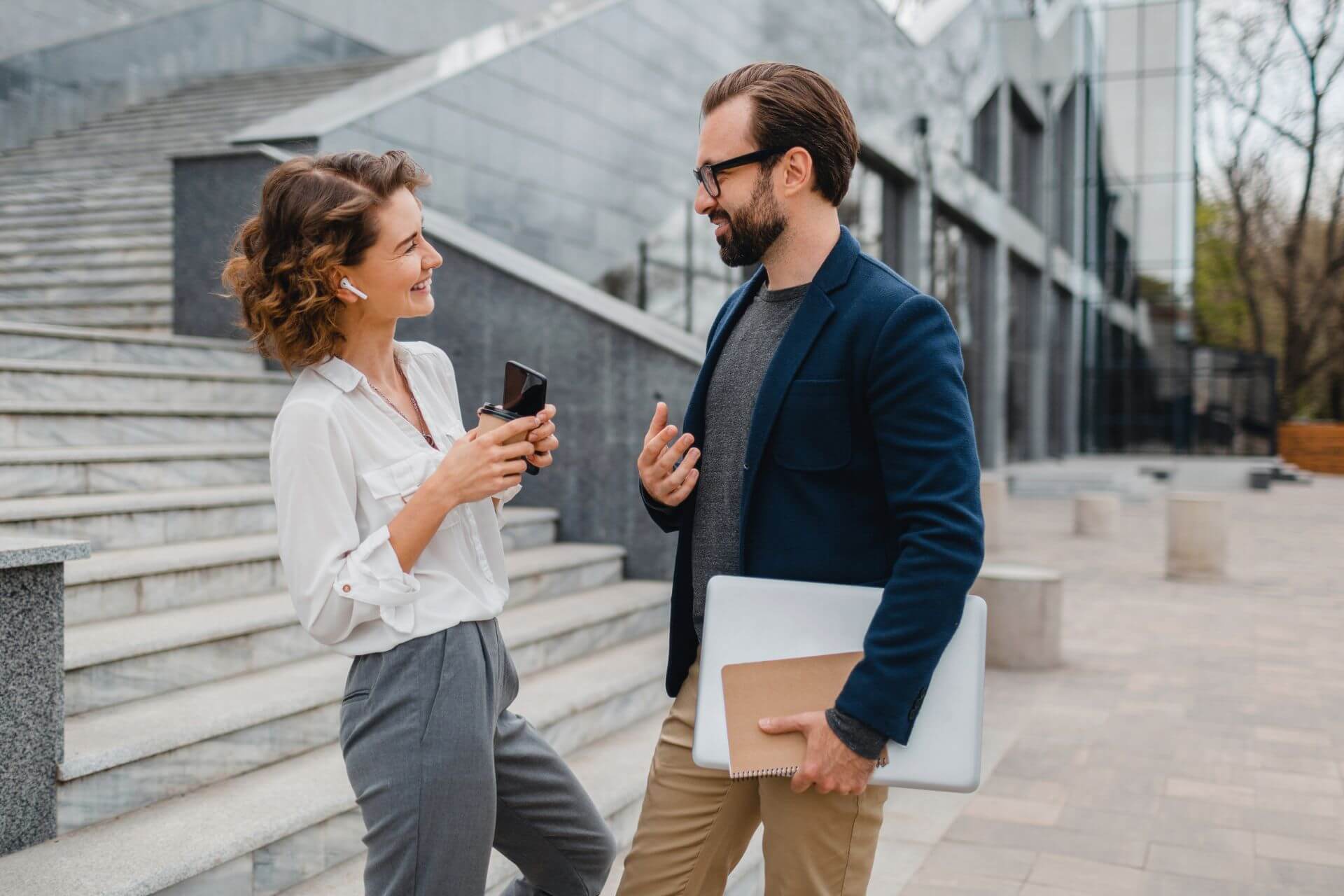 attractive-couple-man-woman-talking-urban-city-center