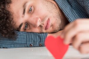 close-up-man-holding-heart